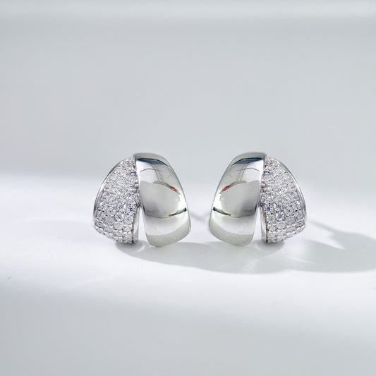 Polished sterling silver stud earrings with pavé zircon detailing