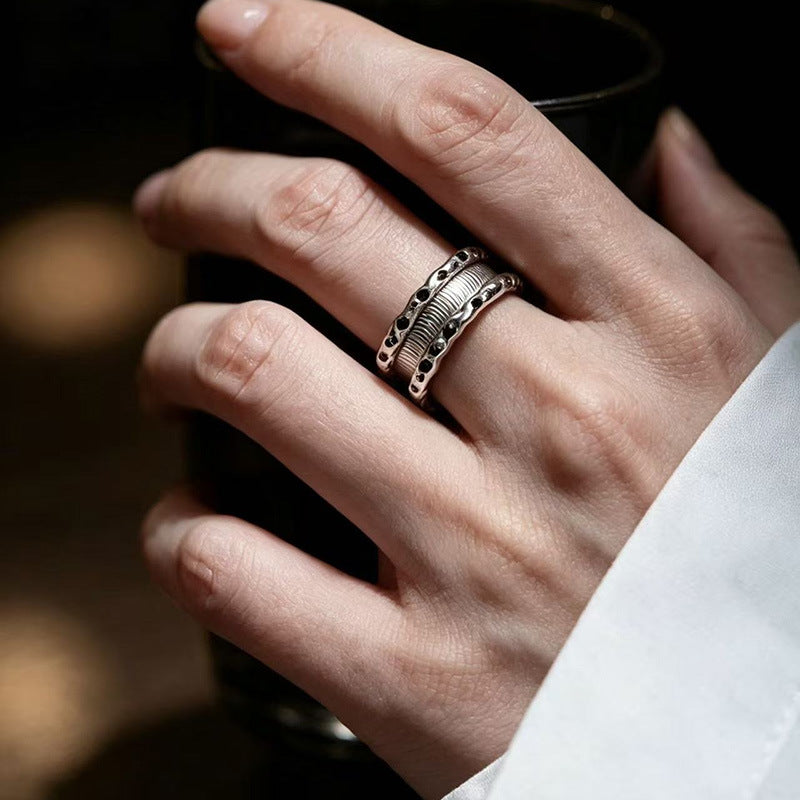 Adjustable sterling silver open ring with layered wave texture