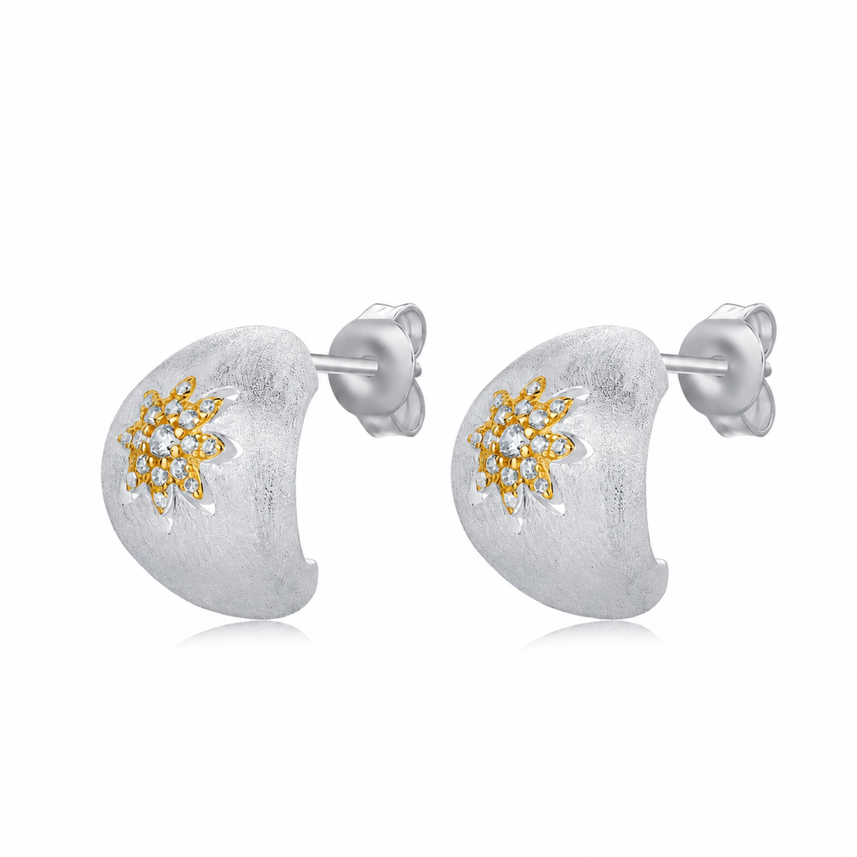 Astra two-tone zircon stud earrings on a white background