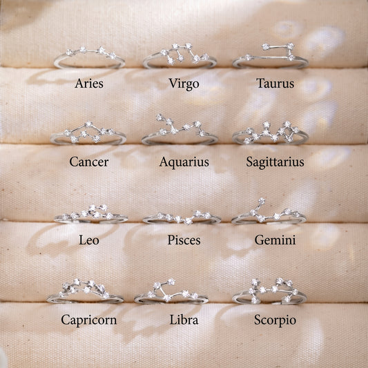 Celeste zodiac sterling silver ring collection arranged by star sign