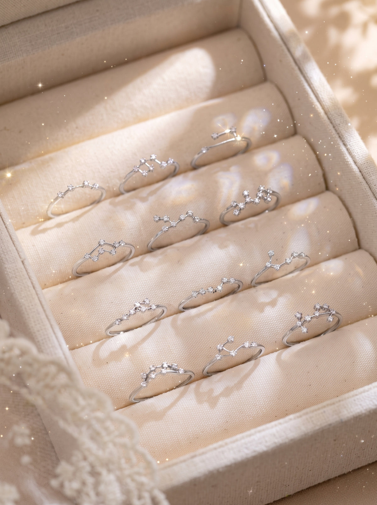 Celeste zodiac sterling silver rings in a jewelry box