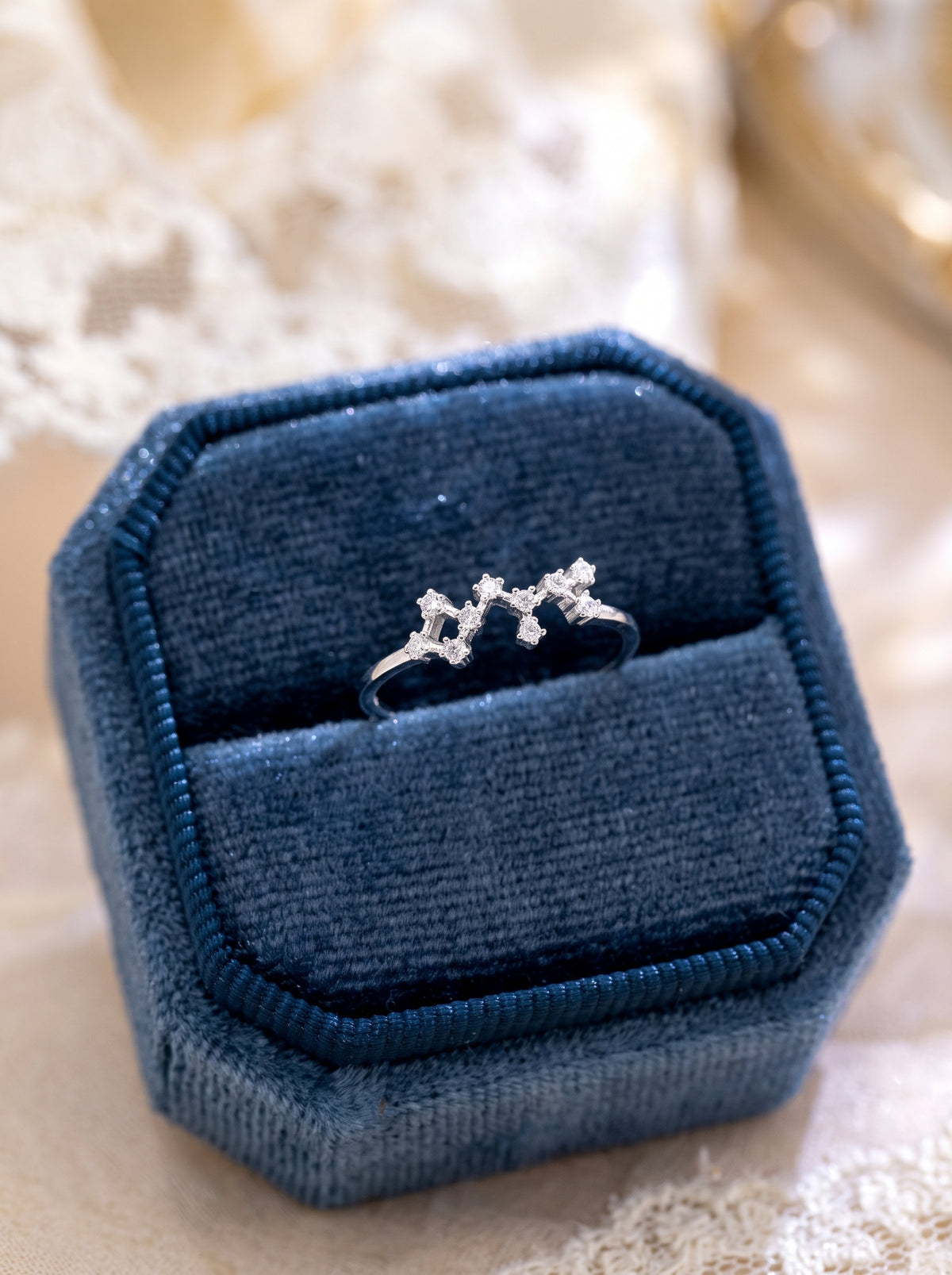 Celeste zodiac sterling silver ring in a jewelry box