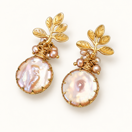 Flora baroque pearl drop earrings on a white background