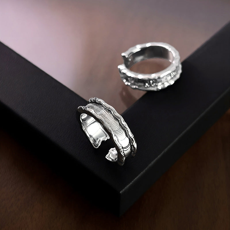 Close-up of Riva silver ring with sculptural wave texture